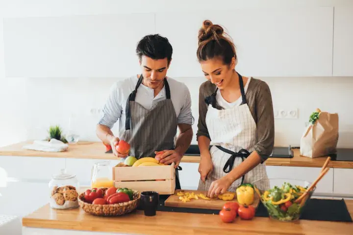 A couple cooking