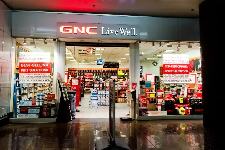 Time is running out for health retailer GNC Holdings, Inc. to shape up. The popular house of nutrition is suffering mightily under the weight of debt.